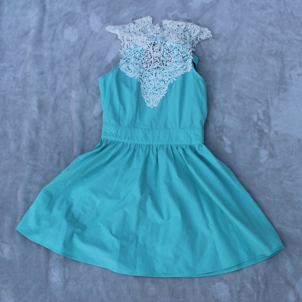 light blue dress w/ white embroidery